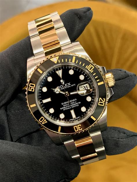 rolex gold and stainless submariner.